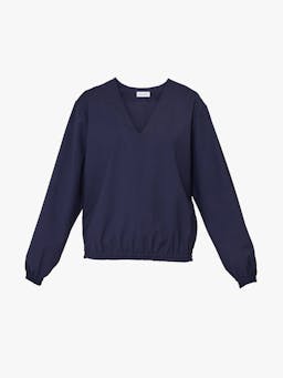 Oversized blue wool sweater by Issue Twelve, with dropped shoulder sleeve and wide v-neck. A perfect addition to the Autumn Winter wardrobe.  Collagerie.com