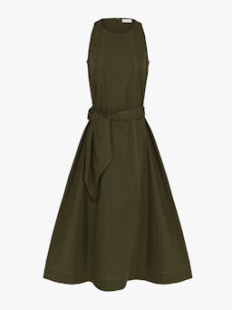 The Tara dress is cut with three front panels, with subtle chartreuse topstitching and wide belt ties at the waist of the a-line shape, gathering the soft olive green cotton poplin.