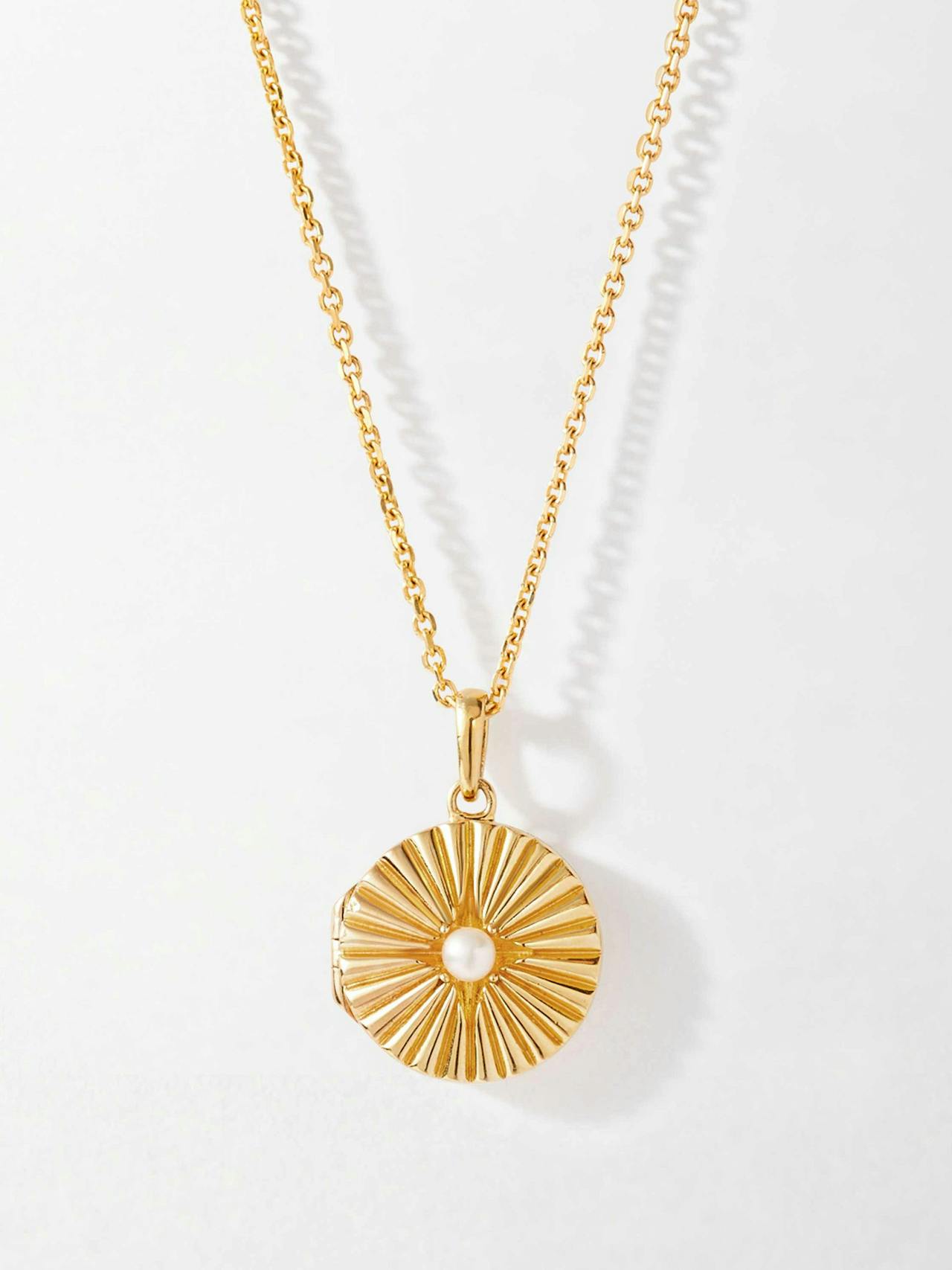 Gold radiant pearl locket necklace