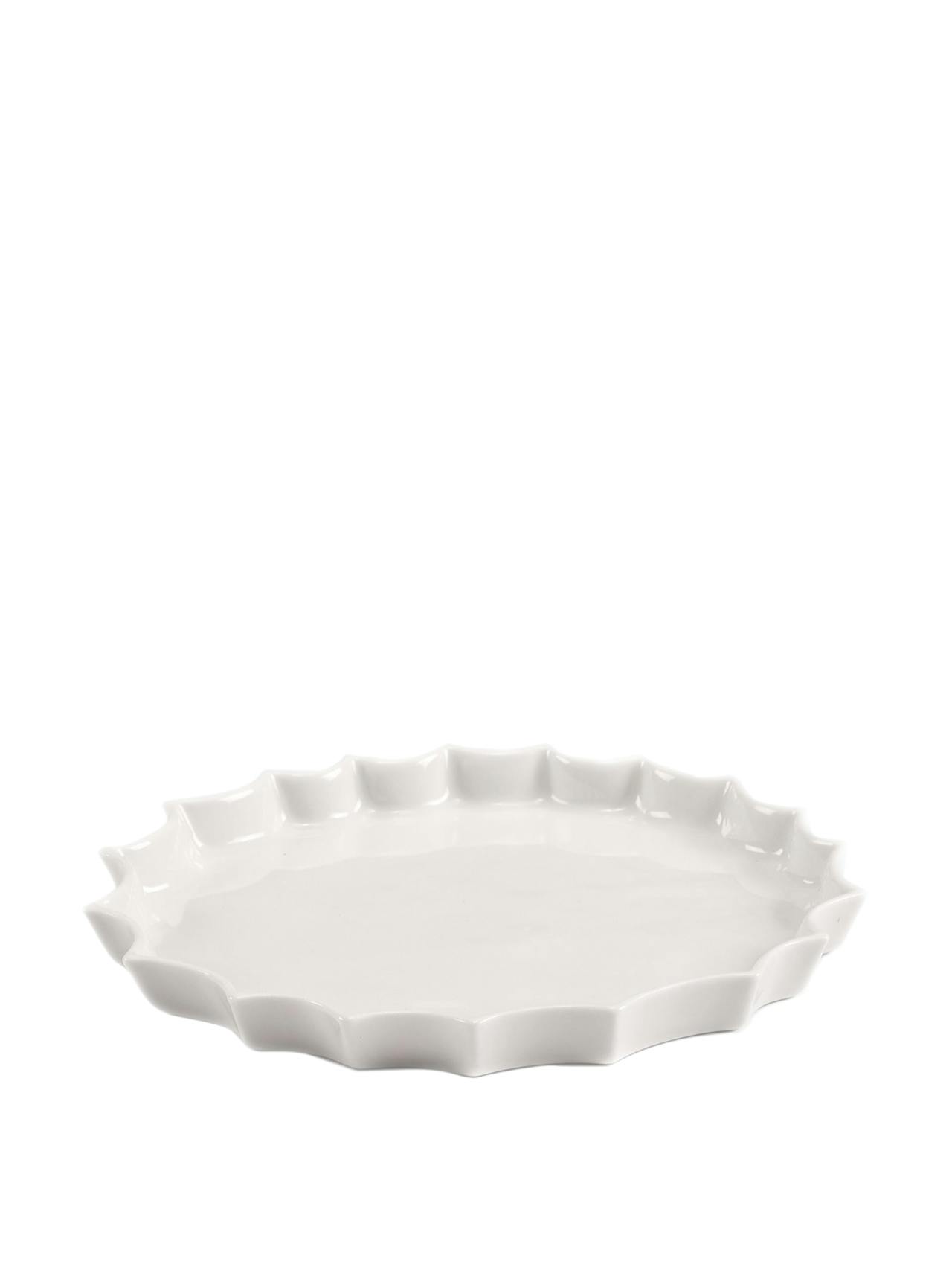 Looking sharp, this The Sette plate makes an unexpected table accent that guests will love. Collagerie.com