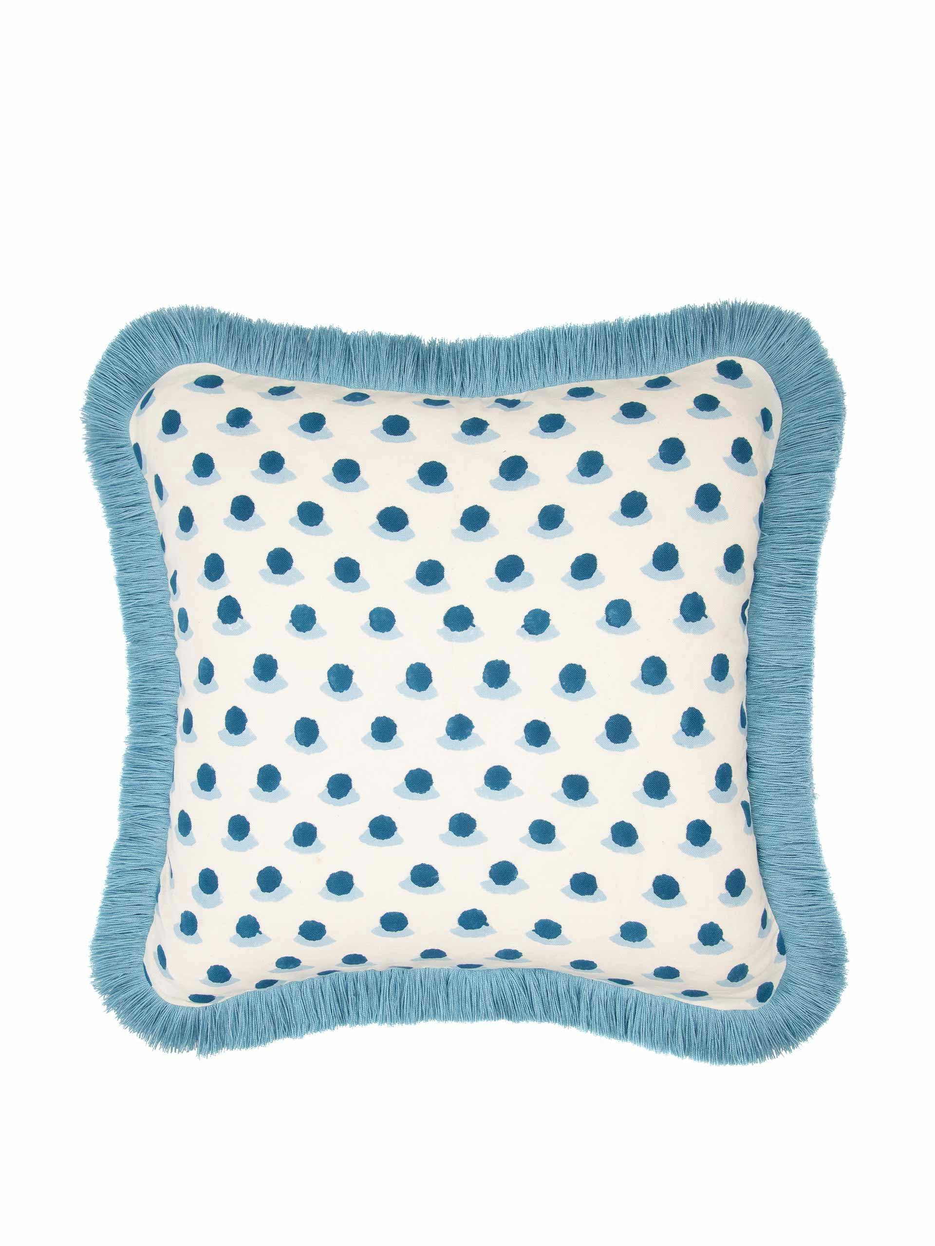 Blue fringed cushion
