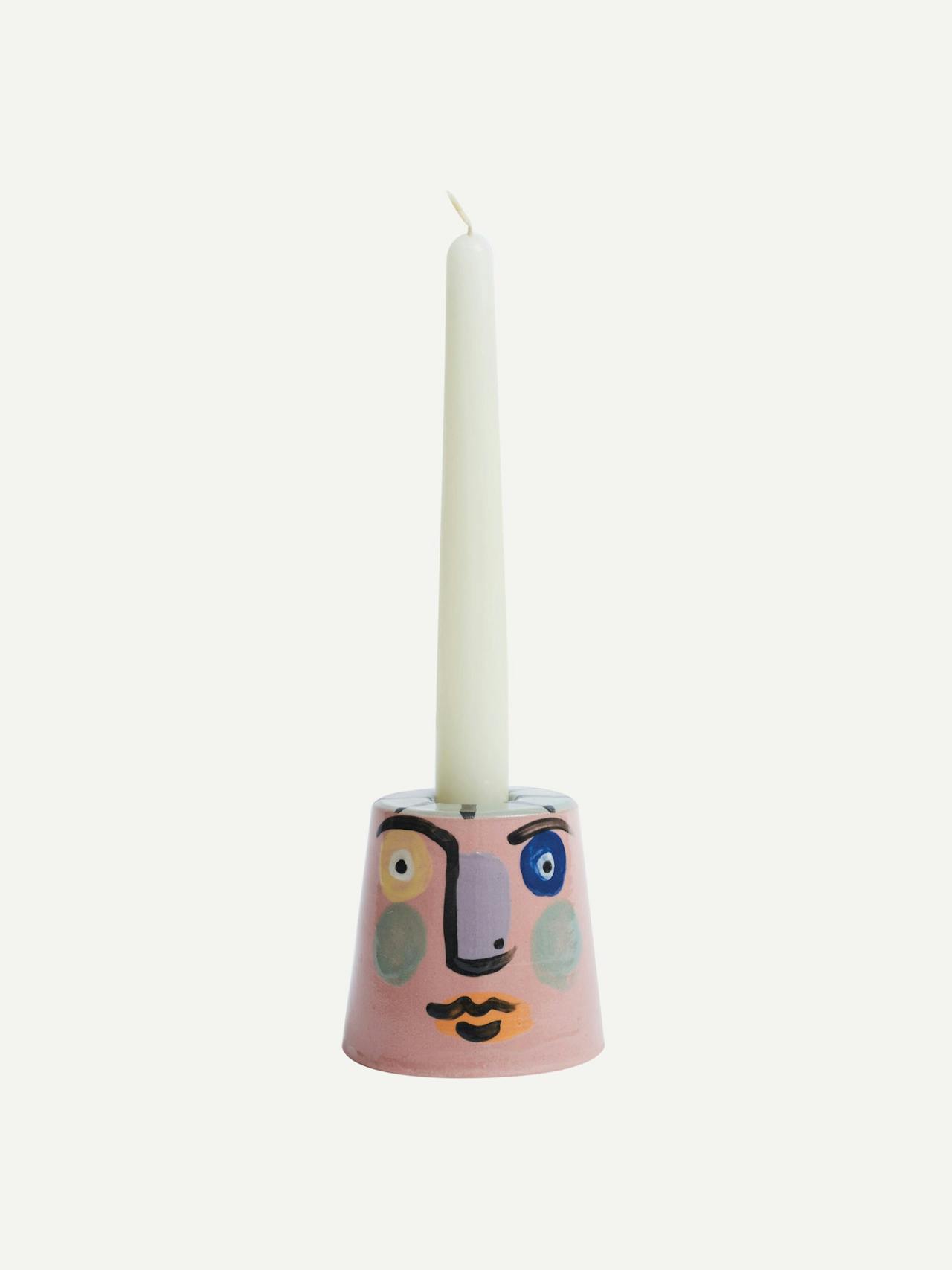 Pink isolation face candle holder