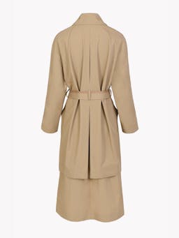 This Issue Twelve double-breasted, oversized fit coat is the perfect classic trench for any outfit. Collagerie.com