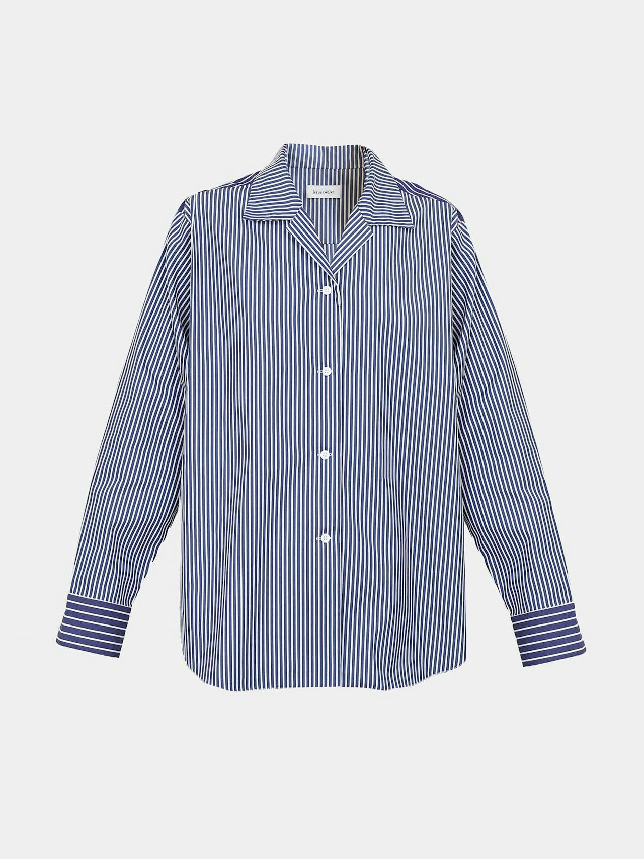 The Milo blue stripe shirt is generous in the body, fitted with a camp collar and curved hem. A great addition to the Autumn Winter wardrobe. Collagerie.com