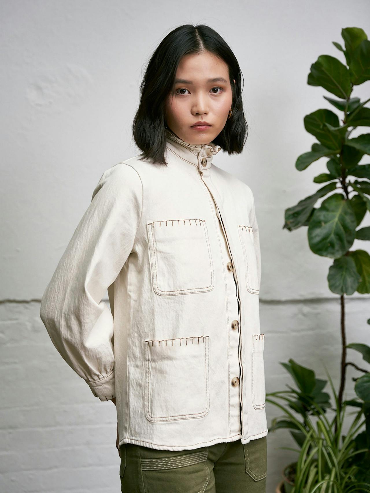 The perfect trans-seasonal Seventy + Mochi shacket in white ecru denim. Loose fitting body with balloon sleeve shaping and hand-done blanket stitching. Collagerie.com