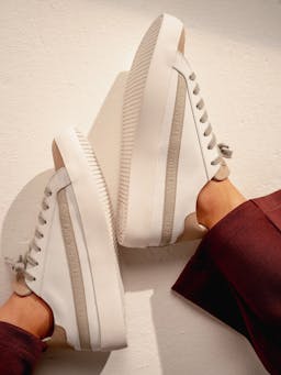 The Lorcan made from premium white leather with SM embossed grey leather side strip. Maximum comfort cushioned footbed, recycled shoebag included. collagerie.com