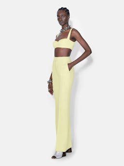 Galvan tailored pale yellow suit trousers from Resort '23 collection. Flared leg trousers. Collagerie.com