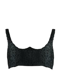 Sculpted from an elegant black guipure lace and finished with curved detail at the bust. With a wife-set neckline this is a key styling piece for AW22. Collagerie.com