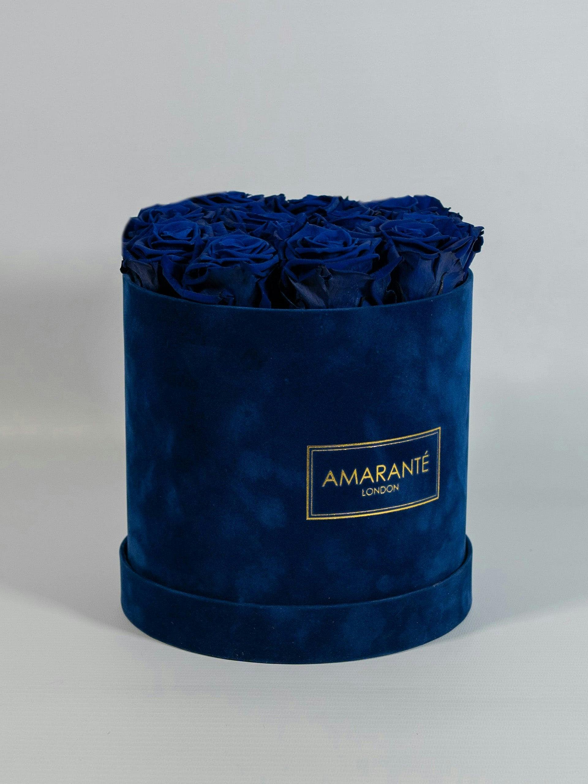Medium round royal blue suede rose box