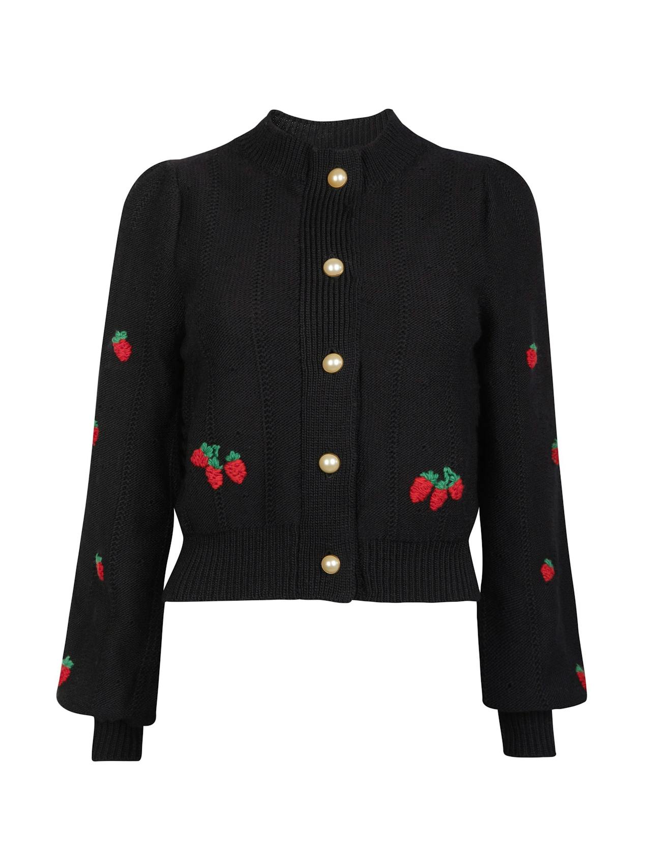 This Beulah London cardigan is the perfect addition to your wardrobe, designed in a cropped style with beautiful bishop sleeves. Collagerie.com