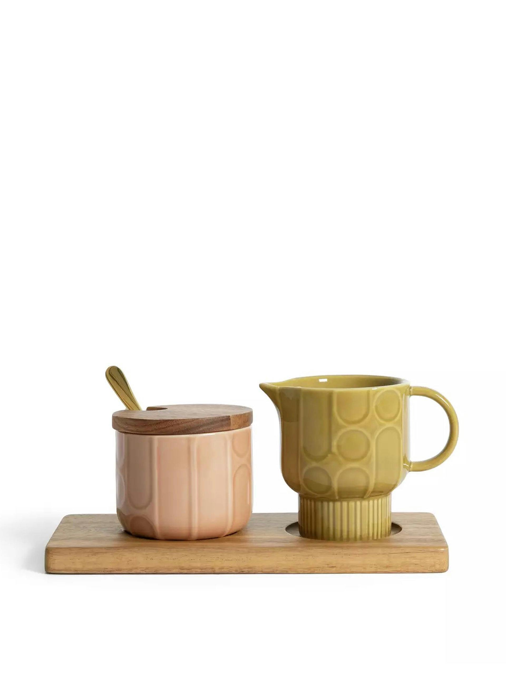 Ceramic milk jug and sugar pot