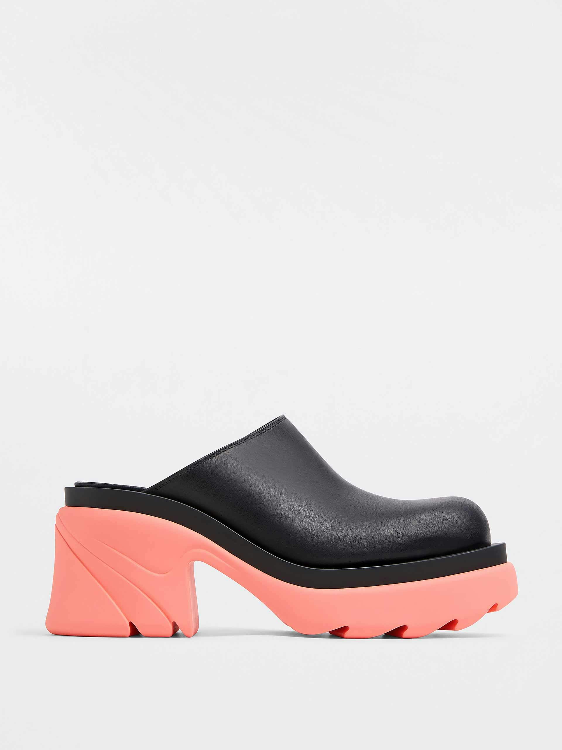 Leather mules with chunky rubber heel