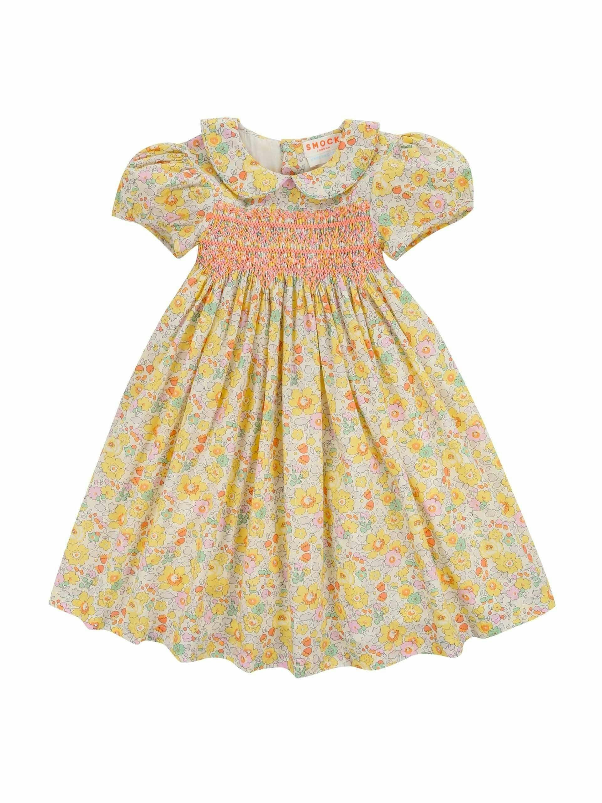 Floral dress with coral smocking