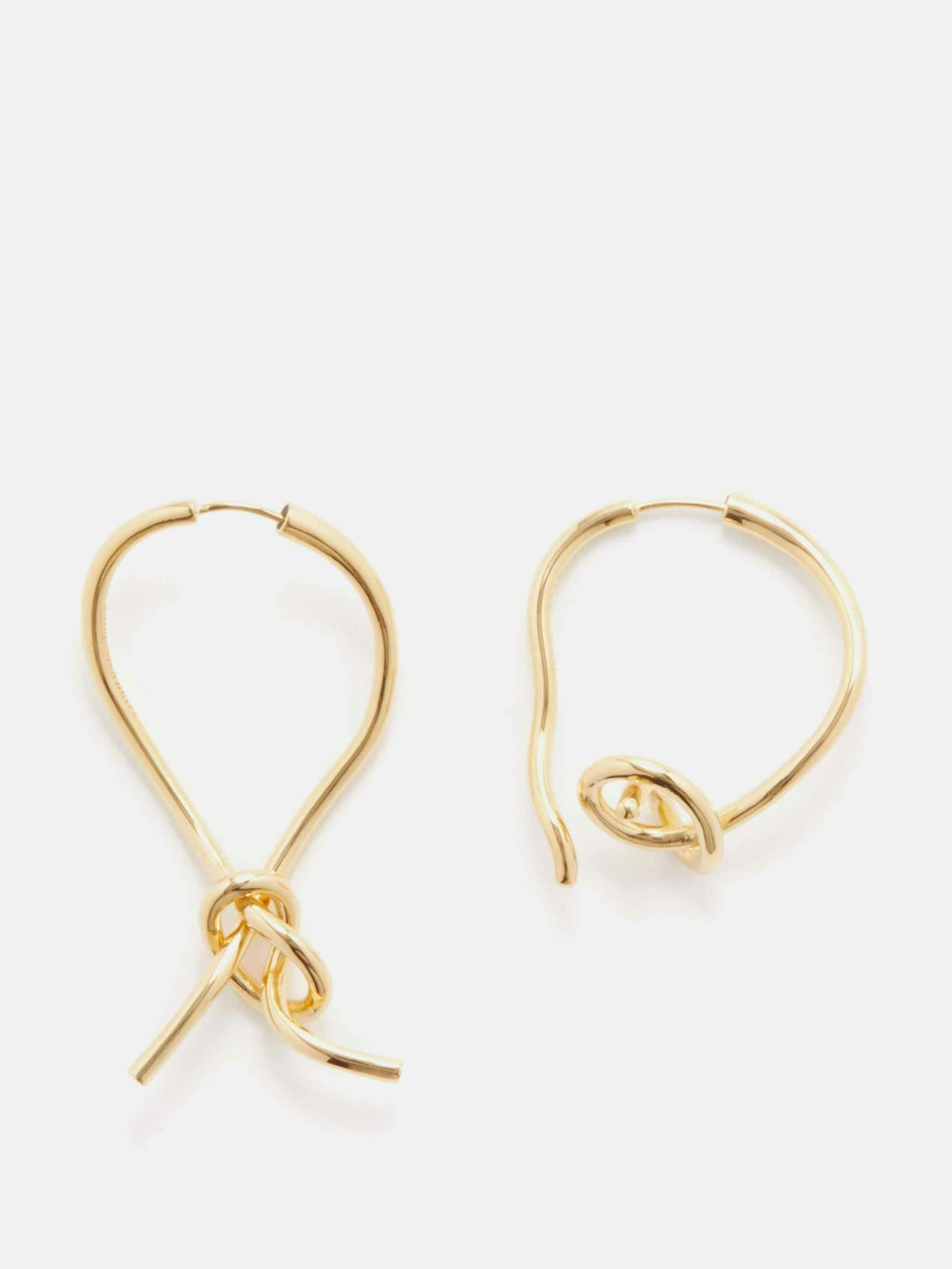 Mismatched knot gold hoop earrings