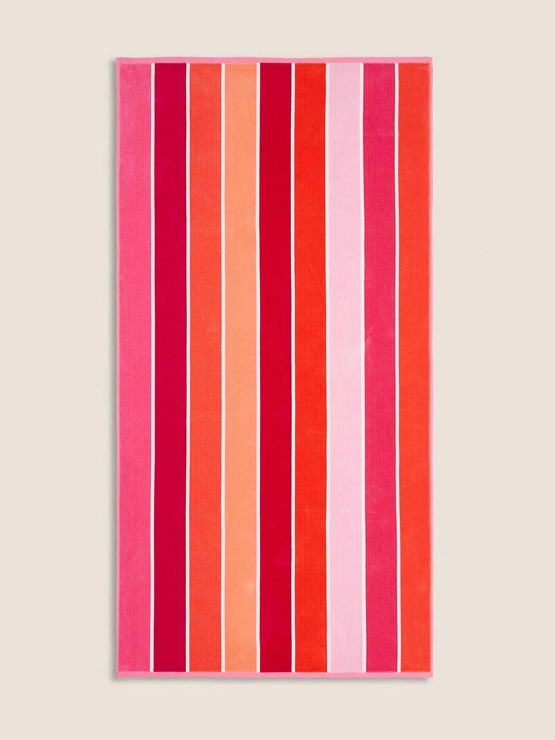 Red and pink striped beach towel