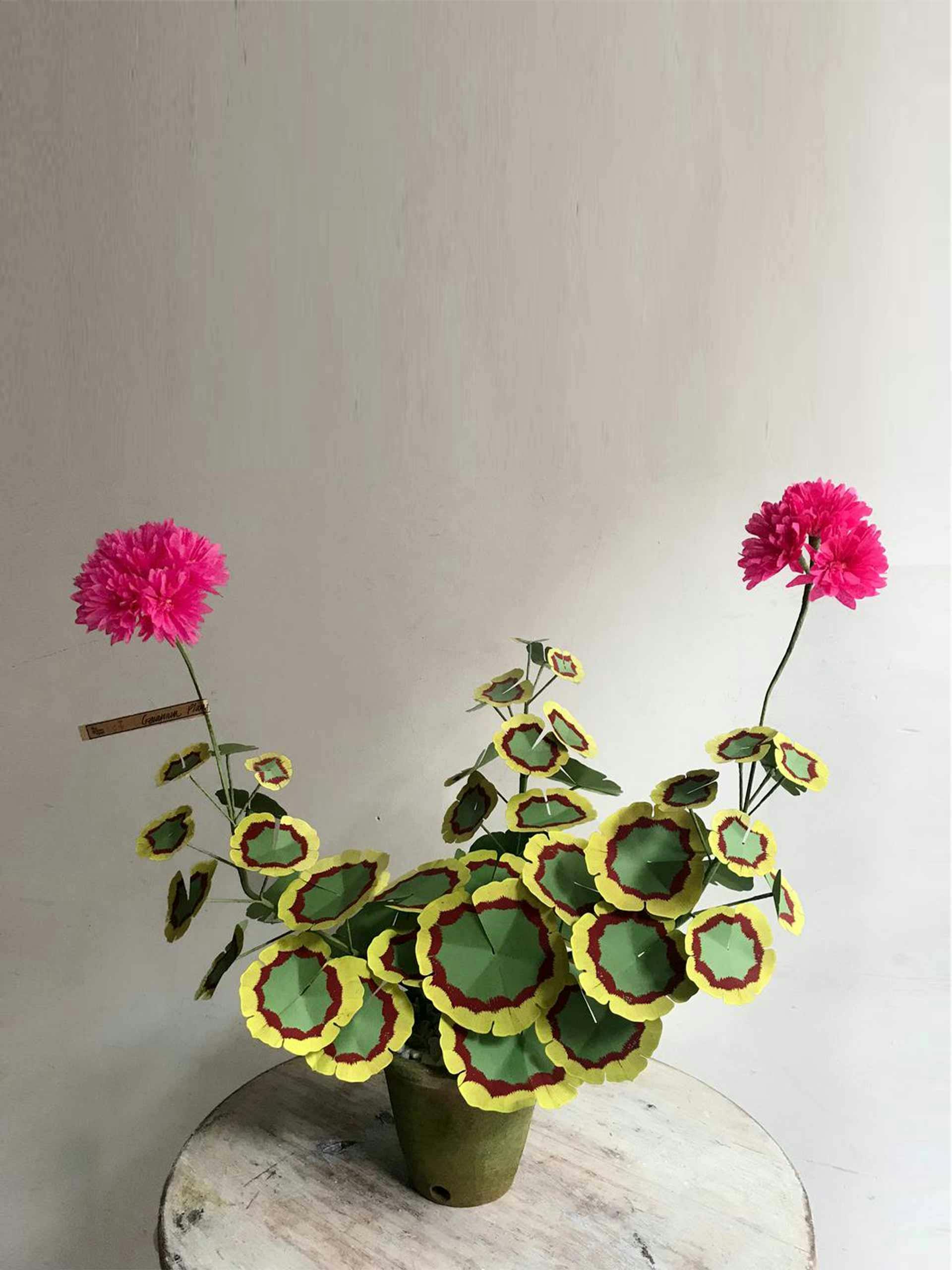 Handmade pink Geranium with a green vase