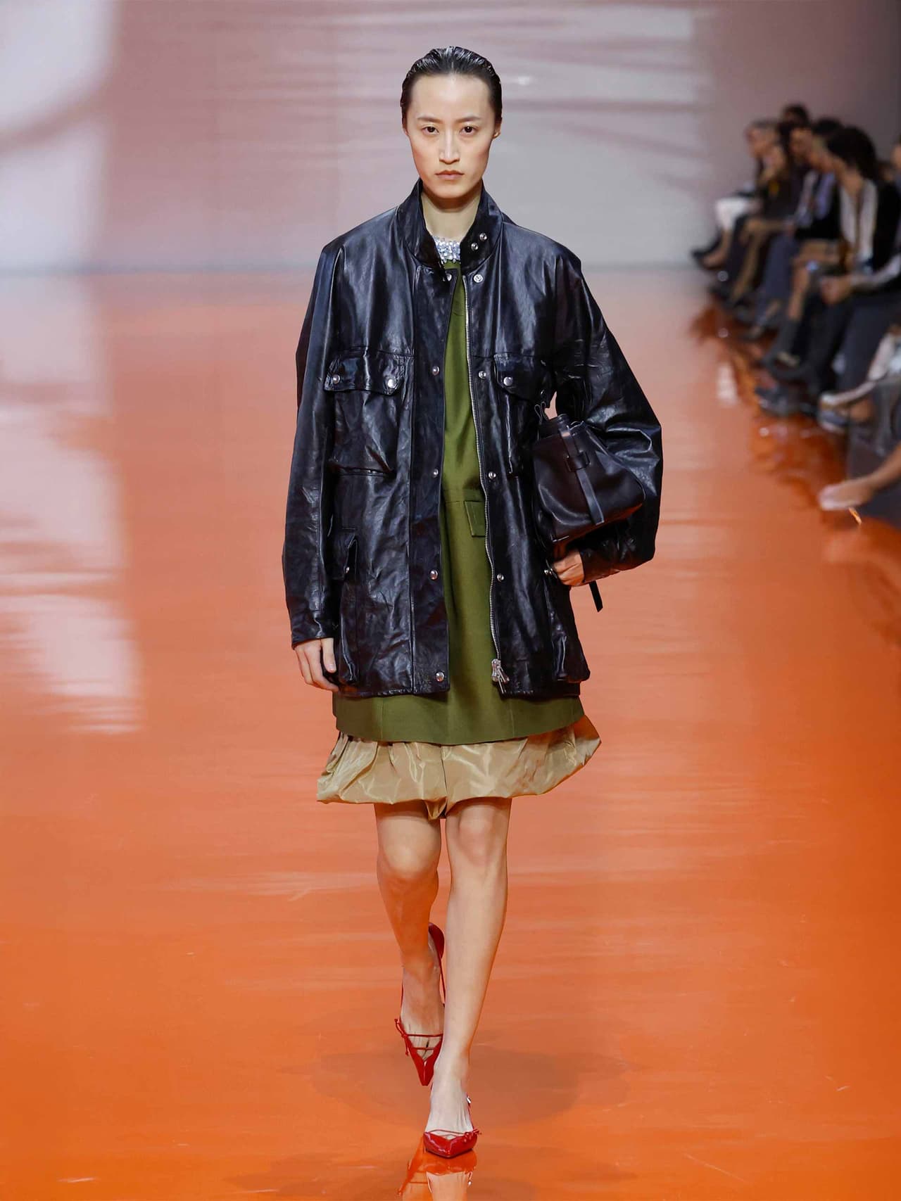 bydesigner-holding-prada-ss26-1 Image: Prada SS26