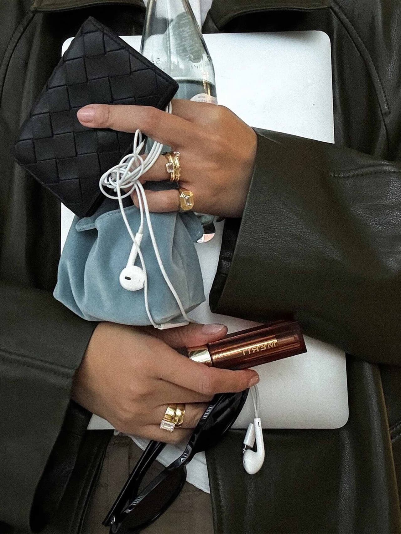 makeupbag-holding-merit Image: Merit