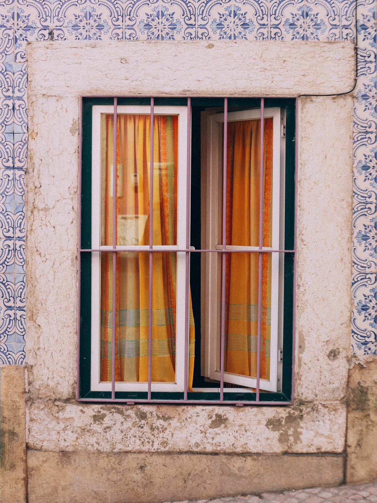 lisbon-holding-kelsey-curtis-unsplash Image: Kelsey Curtis via Unsplash